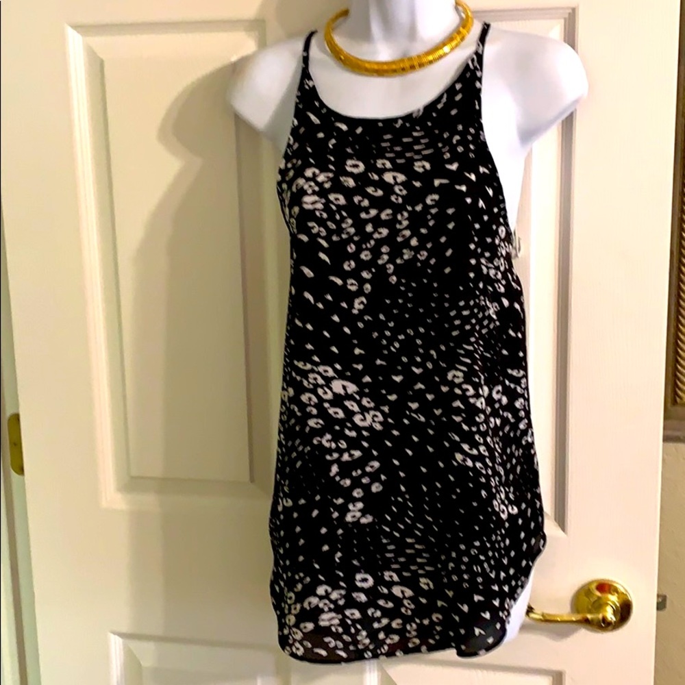 Black 💰and white tank top asymmetrical bottom